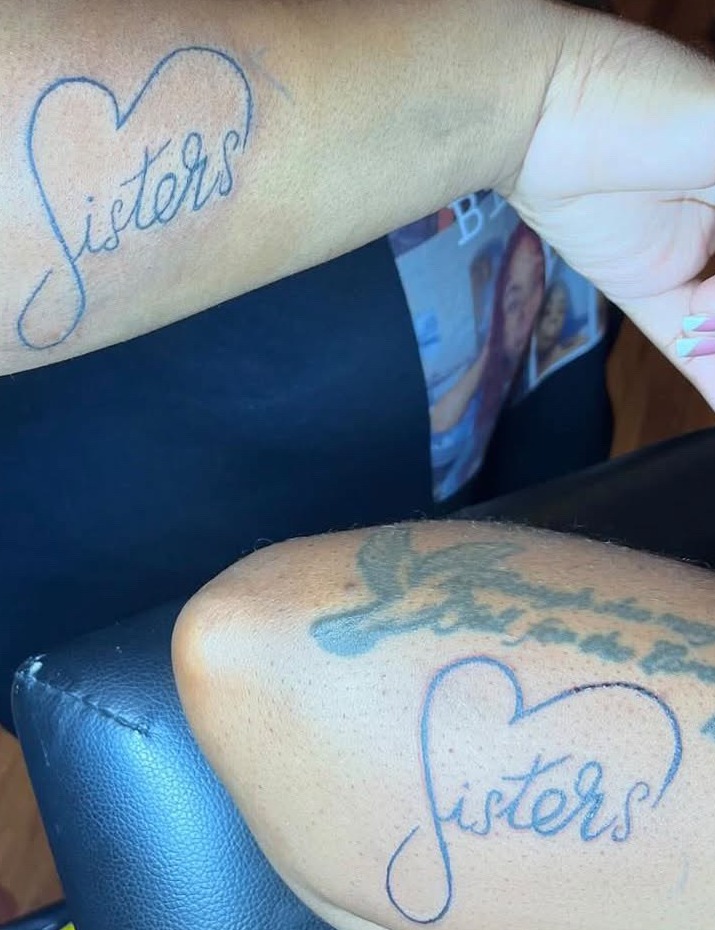 Matching sisters tattoo — script & linework